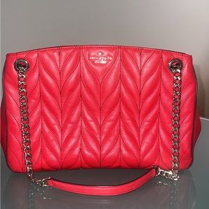 Red quilted Kate Spade bag